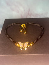 Load image into Gallery viewer, Gold Butterfly Bracelet w/Black Cord
